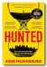 Book cover of 'Hunted' by Abir Mukherjee with a yellow background and red text.