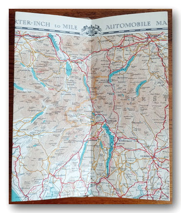 Vintage map of The Lake District, Great Britain on a table.