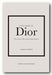 Book titled 'Little Book of Dior' by Karen Homer on a light gray background