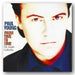 Album cover of 'From Time to Time' by Paul Young with a close-up of his face.