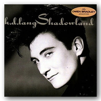 Album cover of 'Shadowland' by k.d. lang featuring a black and white portrait.