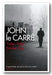The cover of the book 'Tinker, Tailor, Soldier, Spy' by John le Carré, featuring a black and white image of a person walking away on a path with trees on either side, title and author name displayed.
